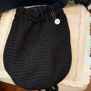 The Sak black crochet drawstring boho style backpack 12 x 14